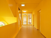 Staircase in enclosed solid wood construction